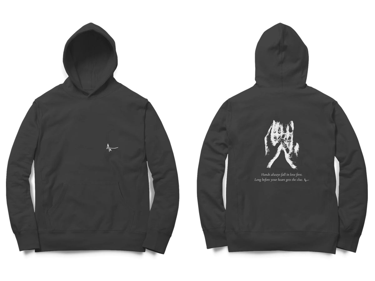Held Hands Hoodie – Ak logo front, sketch + poem back – Black (front and back)